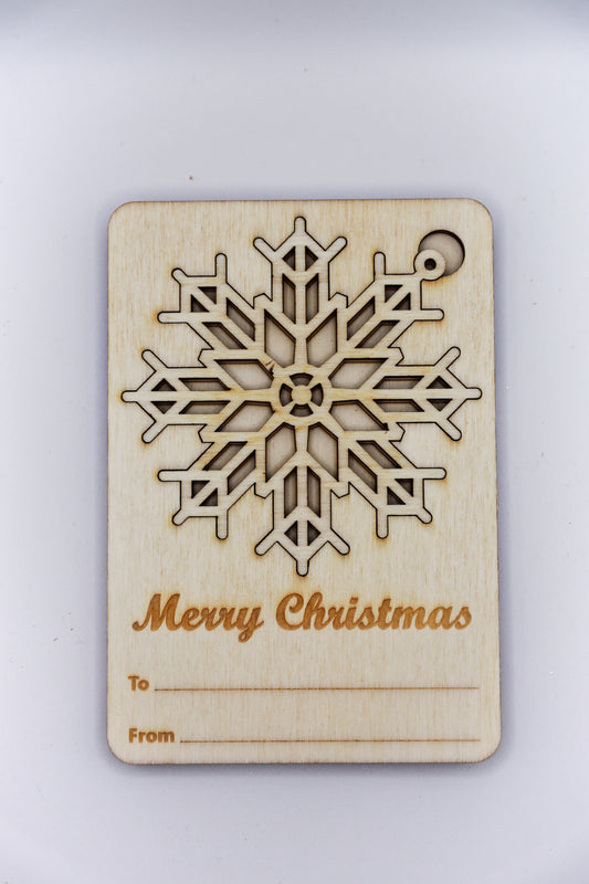 Weihnachtskarte aus Holz mit Schneeflocke
